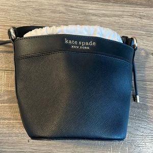 Kate Spade small bucket bag with extra adjustable strap.